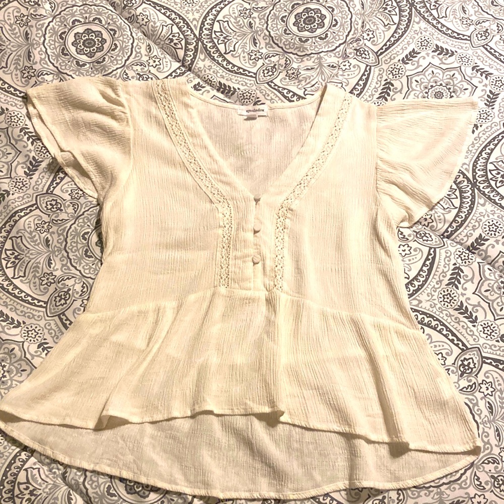 Cream blouse. Short sleeved. Size small.